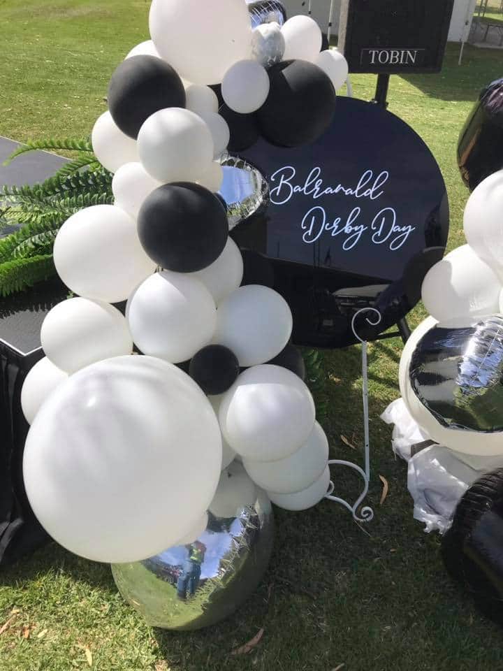 Black Acrylic Disk Sign Hire (not available to hire without a backdrop and organic garlands) by UpUpNAwayBalloons