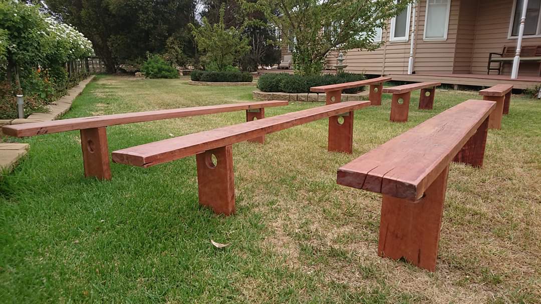 Redgum Bench Seats for Hire by UpUpNAwayBalloons