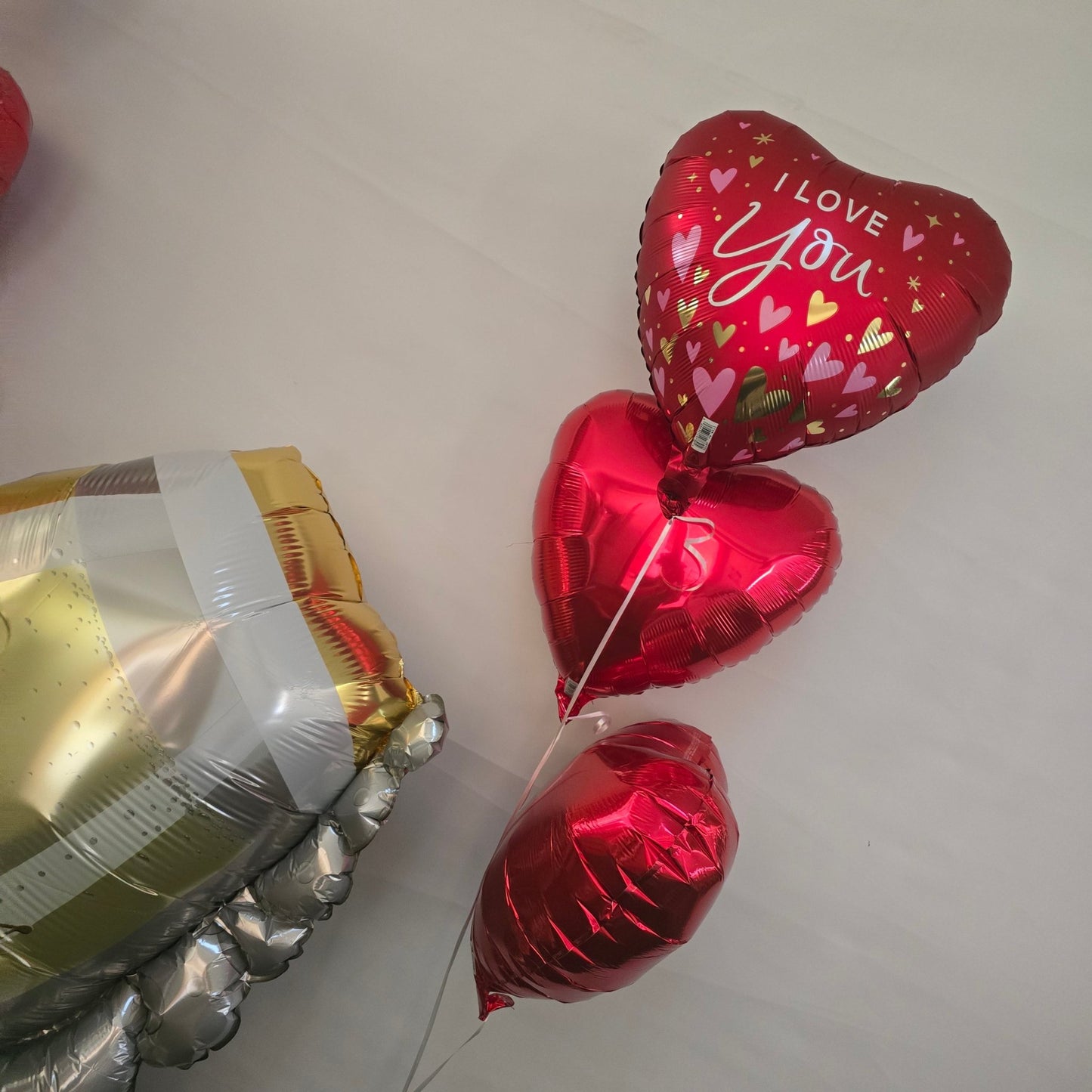 3 Heart Helium bouquet - UpUpNAwayBalloons