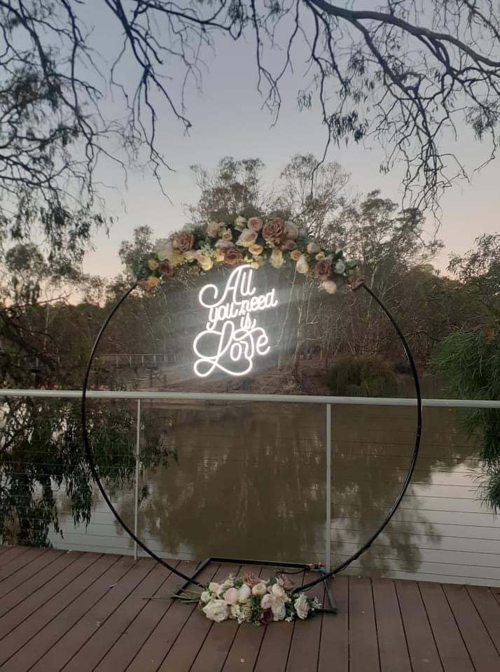 All You Need Is LOVE Neon Sign for Hire - only available when hiring a backdrop and ordering a balloon garland by UpUpNAwayBalloons