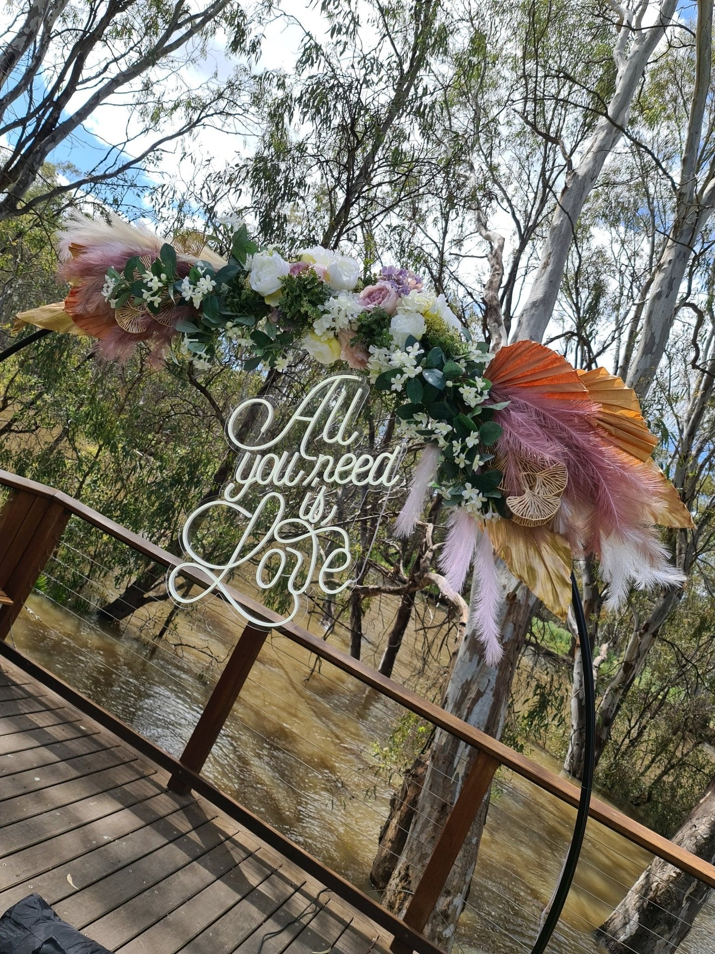 All You Need Is LOVE Neon Sign for Hire - only available when hiring a backdrop and ordering a balloon garland by UpUpNAwayBalloons