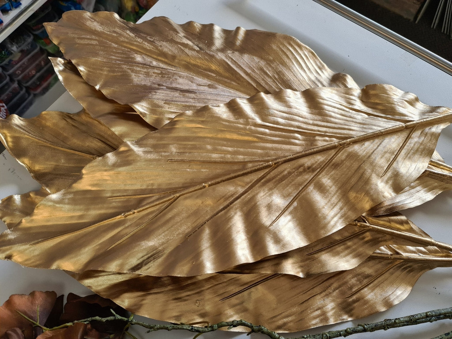 Artificial Flowers and Greenery for hire - available for hire when hiring a backdrop with us and an Organic Balloon Garland by UpUpNAwayBalloons