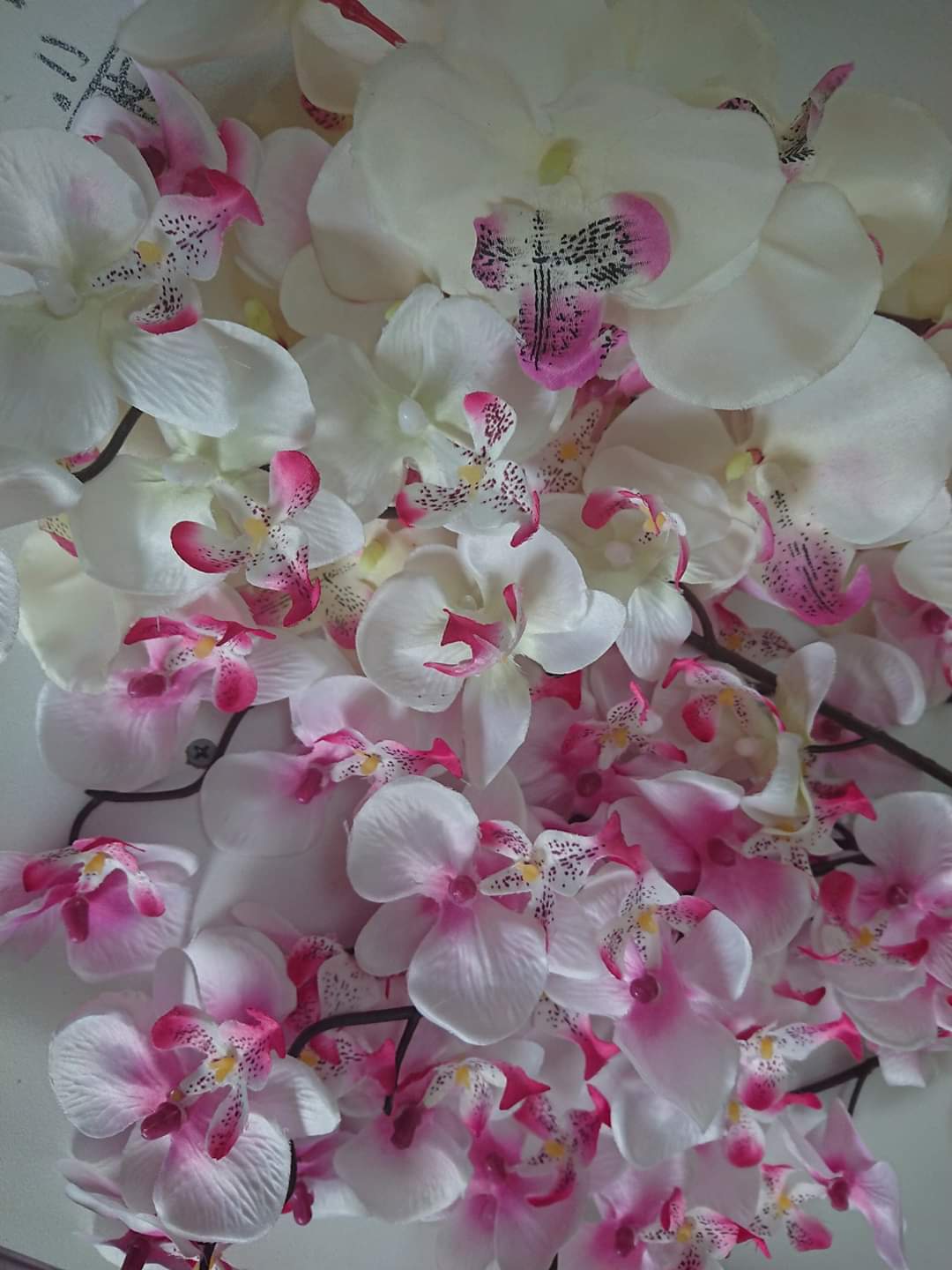 Artificial Flowers and Greenery for hire - available for hire when hiring a backdrop with us and an Organic Balloon Garland by UpUpNAwayBalloons