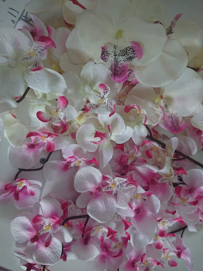 Artificial Flowers and Greenery for hire - available for hire when hiring a backdrop with us and an Organic Balloon Garland by UpUpNAwayBalloons