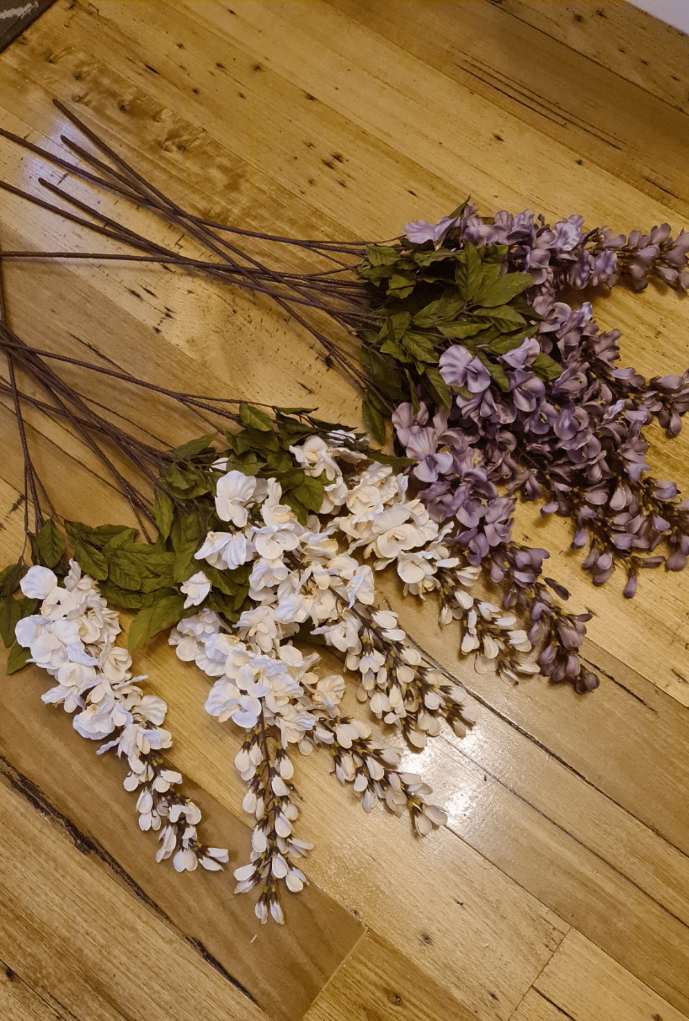 Artificial Flowers and Greenery for hire - available for hire when hiring a backdrop with us and an Organic Balloon Garland by UpUpNAwayBalloons