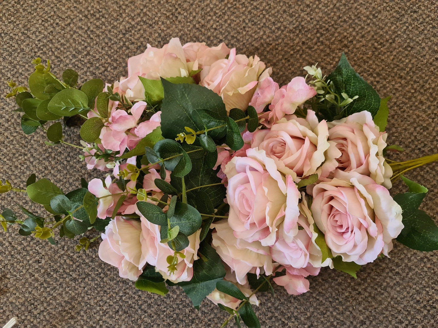 Artificial Flowers and Greenery for hire - available for hire when hiring a backdrop with us and an Organic Balloon Garland by UpUpNAwayBalloons