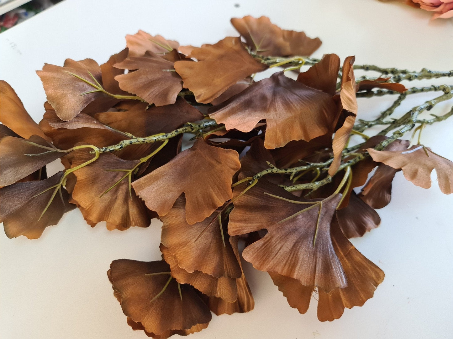 Artificial Flowers and Greenery for hire - available for hire when hiring a backdrop with us and an Organic Balloon Garland by UpUpNAwayBalloons