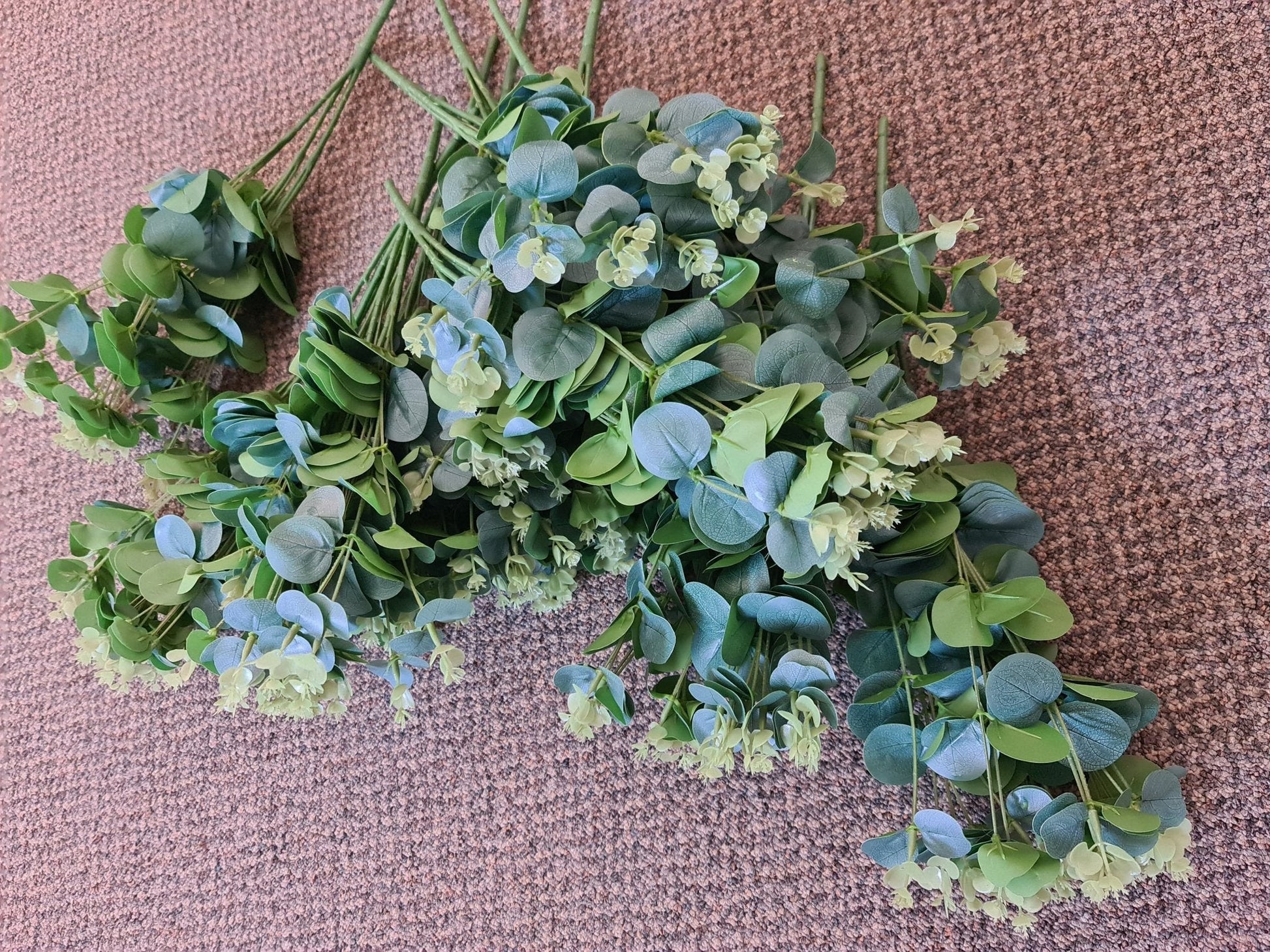 Artificial Flowers and Greenery for hire - available for hire when hiring a backdrop with us and an Organic Balloon Garland by UpUpNAwayBalloons