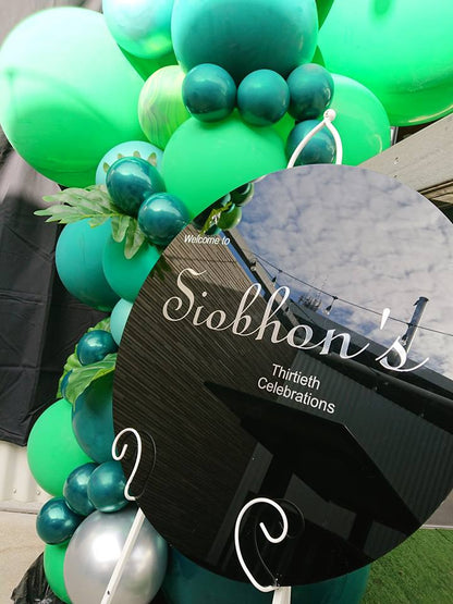 Black Acrylic Disk Sign Hire (not available to hire without a backdrop and organic garlands) by UpUpNAwayBalloons