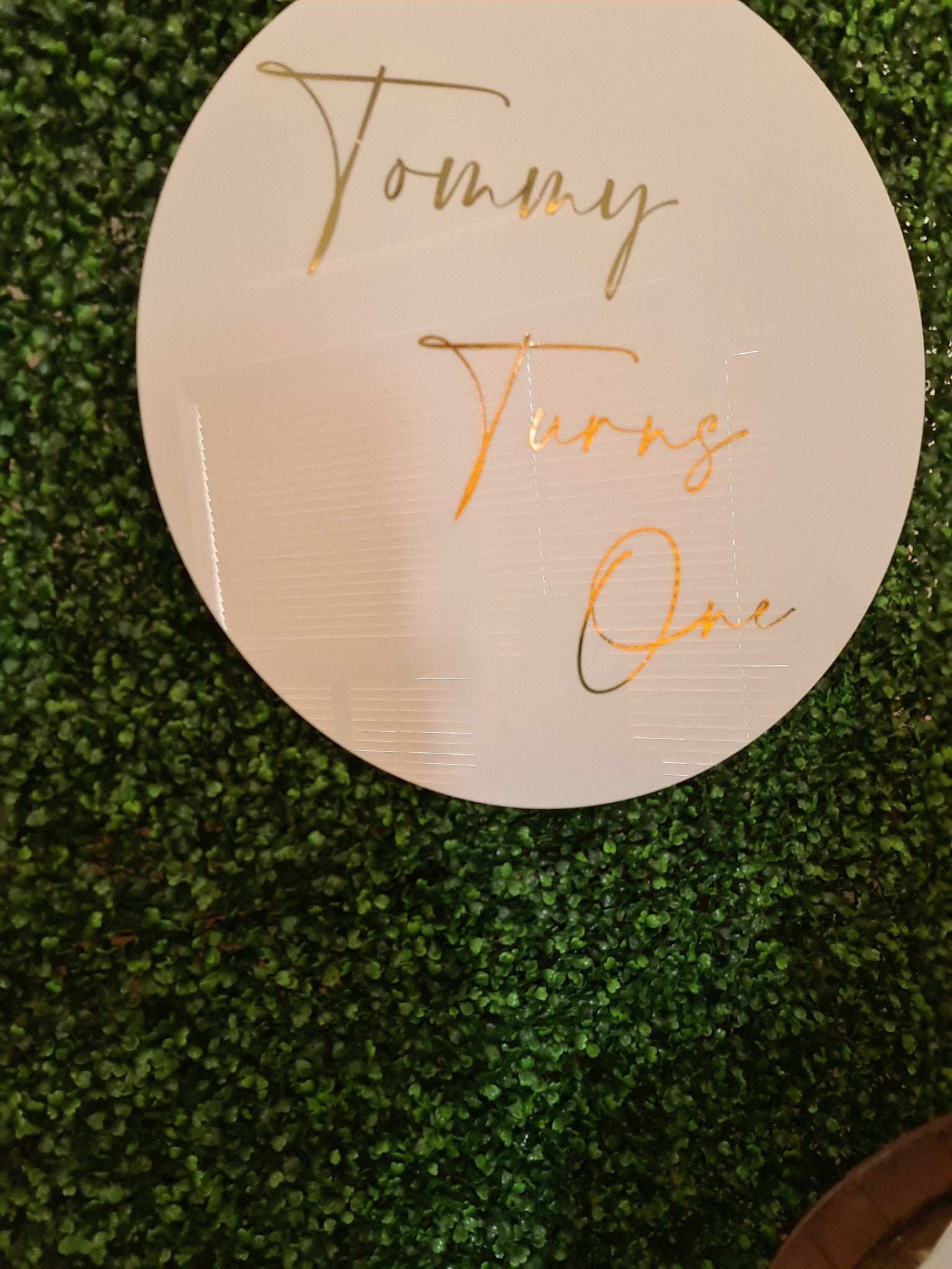 White Acrylic Disk Sign Hire (not available to hire without a backdrop and organic garlands) by UpUpNAwayBalloons