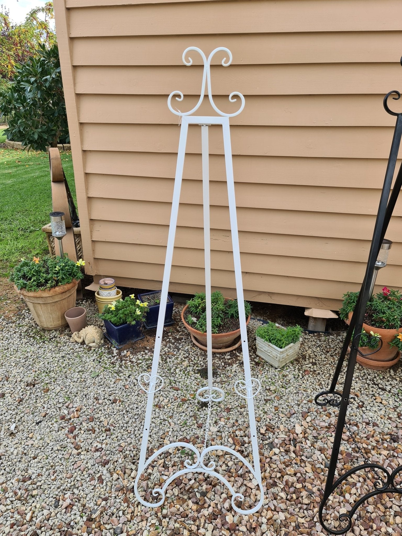 White Easel Hire (not available to hire without a backdrop and organic garlands) by UpUpNAwayBalloons