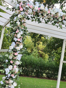 Backdrop flower arrangements - UpUpNAwayBalloons