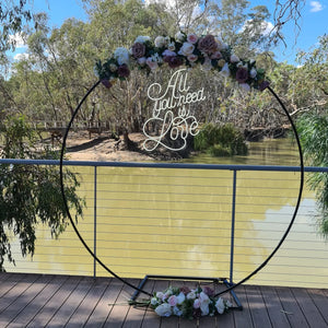 Backdrop flower arrangements - UpUpNAwayBalloons